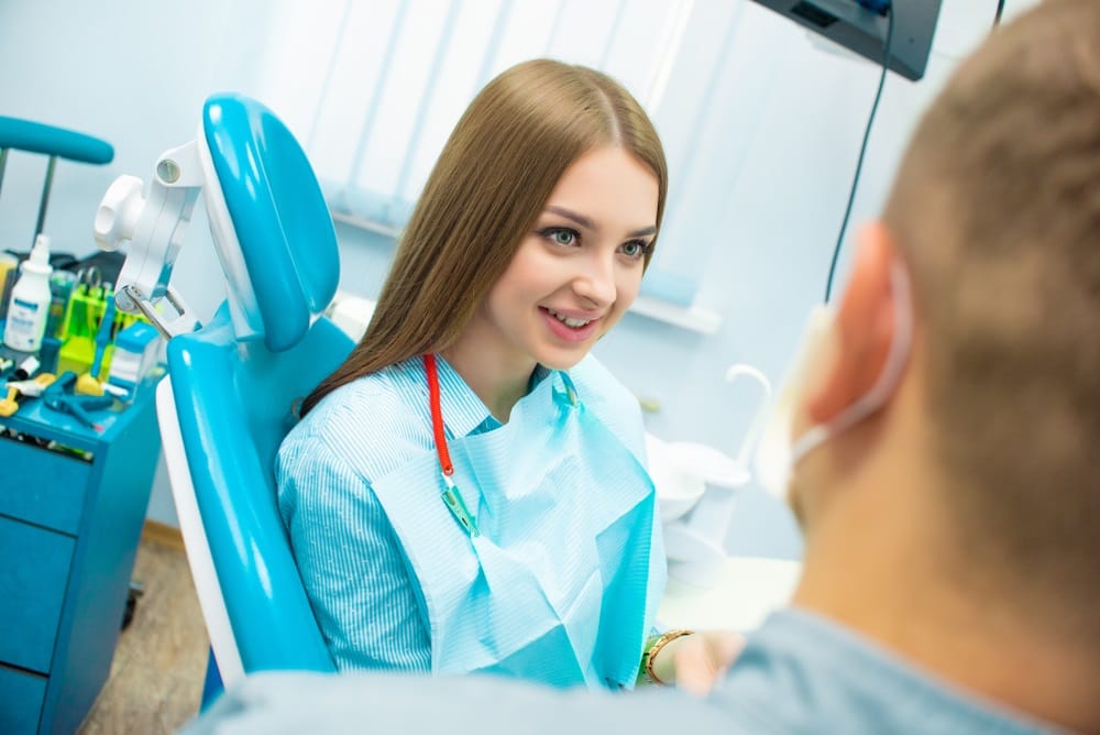 Woman at the dentist - Emergency Dentist in Seattle