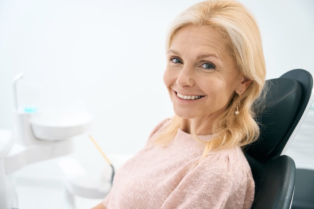 Elderly woman at the dentist - Emergency Dentist in Seattle