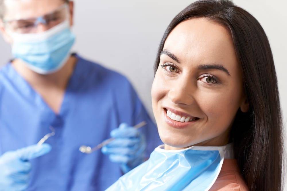 Woman at the dentist - Teeth Whitening in Seattle Woman at the dentist - Teeth Whitening in Seattle